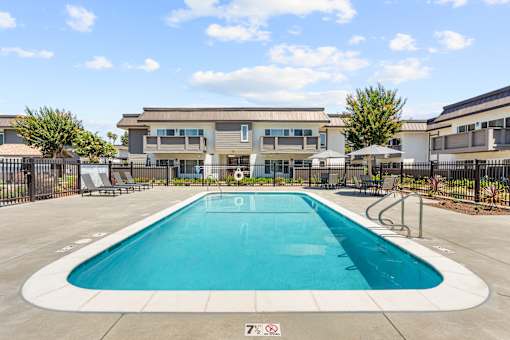 A swimming pool with a 7% sign on the ground.