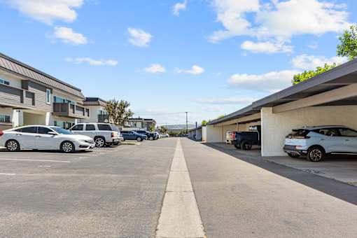 A parking lot with cars parked in it.
