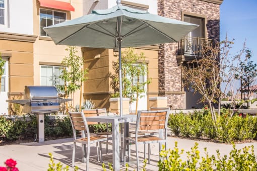 outdoor seating with bbq grills at Capriana at Chino Hills, California, 91709