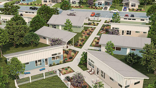 an aerial view of a neighborhood of houses with cars parked