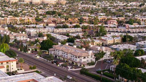 A cityscape with buildings and roads.