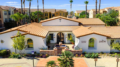 A house with a sign that says "250-M" on the front.