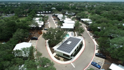 an aerial view of casata community center with a solar panel on the roof