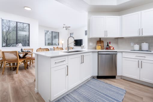Kitchen With White Cabinetry And Appliances at Dobson 2222, Chandler, Arizona