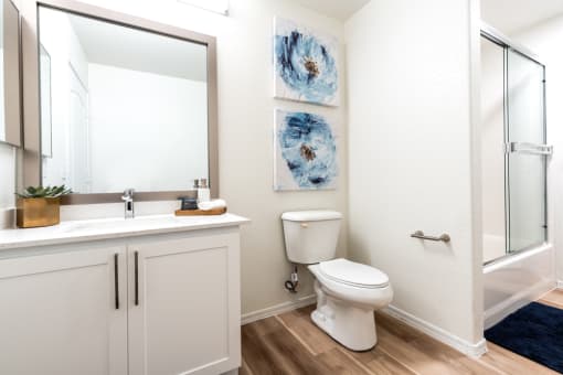 Bathroom with granite counter tops and a large mirror at Dobson 2222, Chandler, AZ, 85286