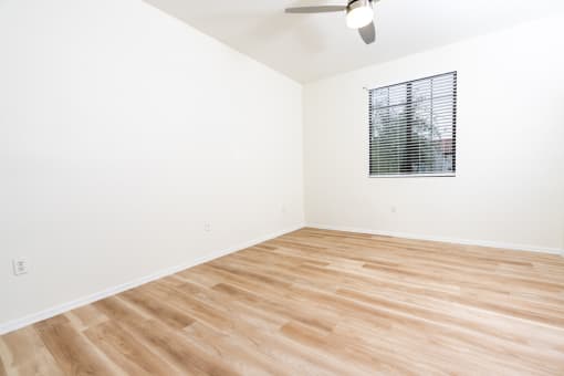 Beautiful Bright Bedroom with hardwood floors and a ceiling fan at Dobson 2222, Arizona, 85286