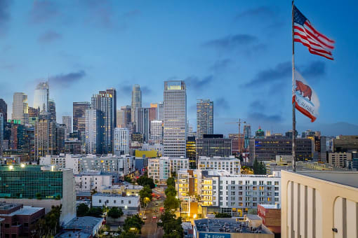a view of the san francisco skyline at dusk