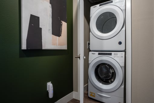 a washer and dryer in the laundry room