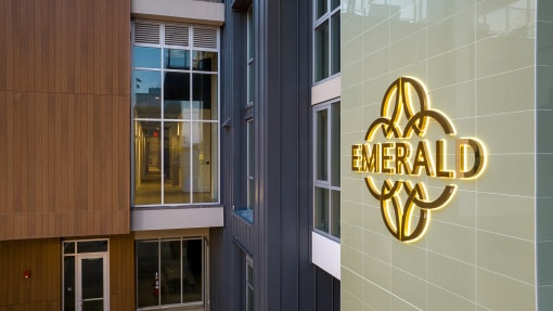 a logo on the side of a building