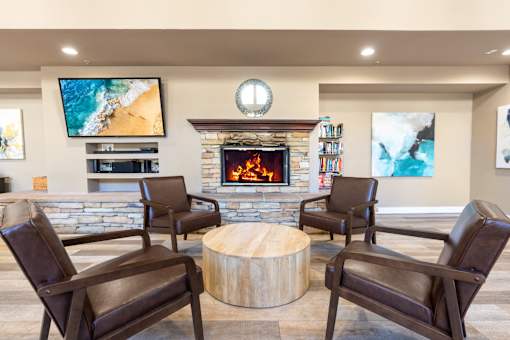 Fireside seating in Clubhouse at FountainGlen Pasadena