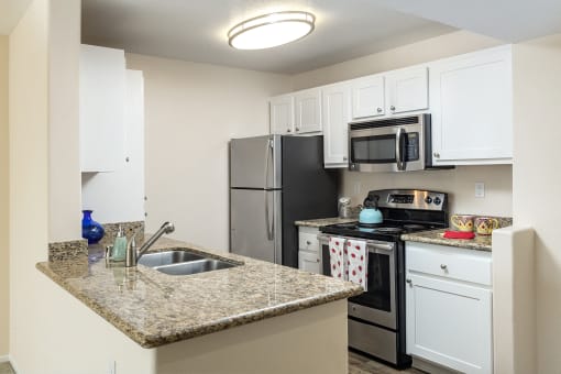 Kitchen Bar With Granite Counter Top at 55+ FountainGlen Rancho Santa Margarita, Rancho Santa Margarita