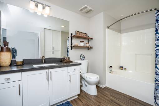 White bathroom at The Grove Apartments, Ontario, 91761