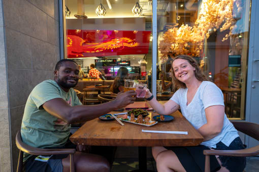 Couple outside of local restraunt. at Imperial Hardware Lofts, Riverside, CA