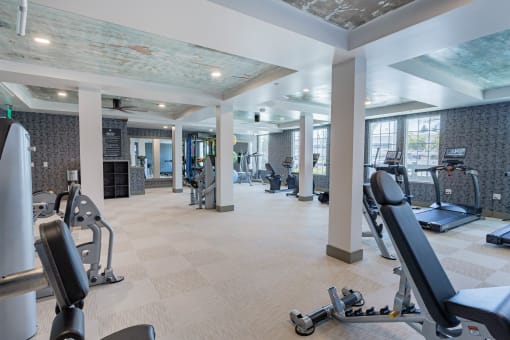 State-Of-The-Art Fitness Center Equipped With Strength Training And Cardio Machines, Yoga Balls, And Plenty Of Windows at Bayswater Apartments, Burlingame, 94010