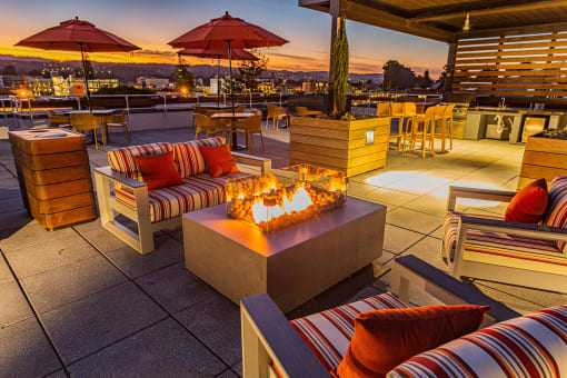 Rooftop lounge seating with fire pit