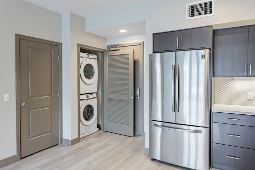 Stainless steel fridge and in unit washer and dryer
