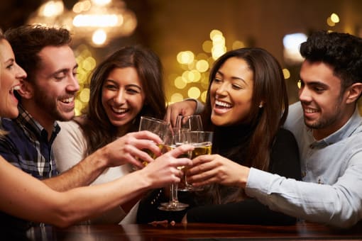 five friends drinking having fun