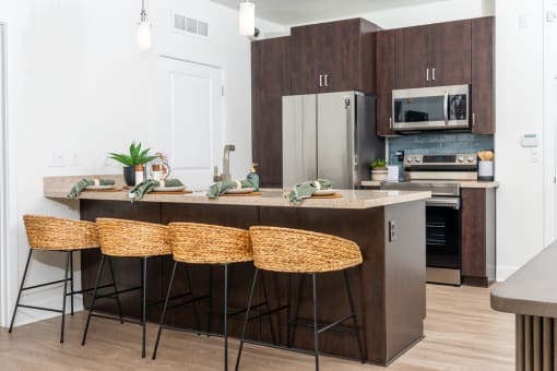 Kitchen with wooden closet at Level at Sixteenth, Arizona