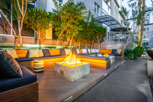 Patio with couches and a fire pit at Level at Sixteenth, Phoenix