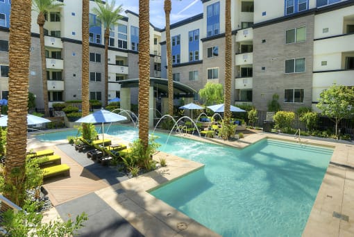 Apartments Phoenix - Level at Sixteenth - Resort-Style Pool with Lounge Chairs and Fountains
