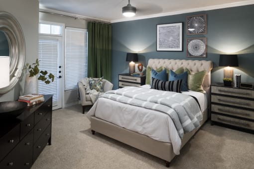 a bedroom with a bed and a dresser and a window at McDermott Place, Plano, TX 75025