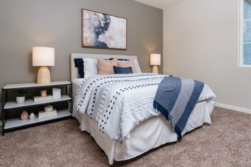 bed and night stand at Miro at the Parc, Henderson, NV 89074