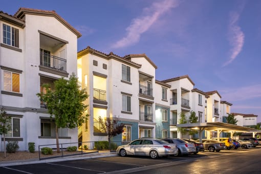 building exterior with parking at Miro at the Parc, Henderson, NV 89074