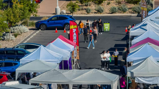 people walking around the farmers market at Miro at the Parc, Nevada