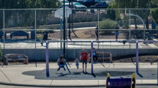 people playing on a playground at a park at Miro at the Parc, Nevada