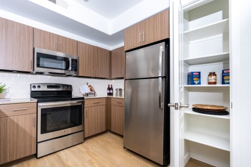 Kitchen with stainless steel appliances at Monument, Arizona