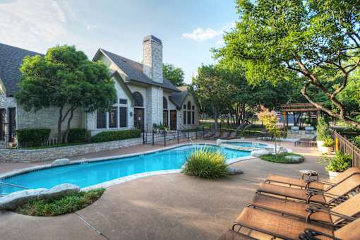 Clubroom with a pool next to it.