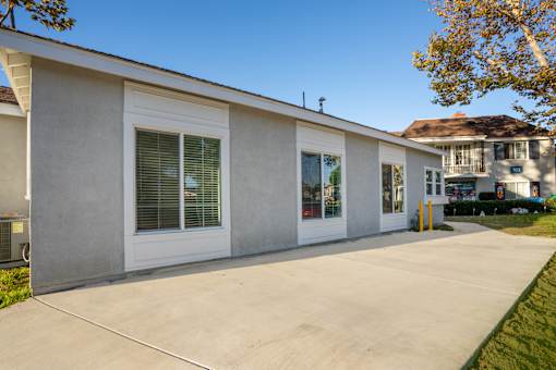 A house with a white exterior at Nola 624, West Covina, CA