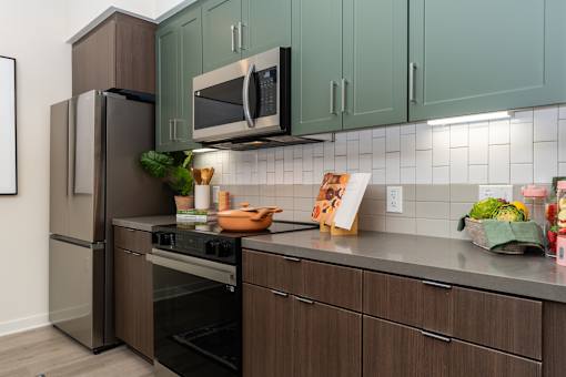 A Kitchen With Brown Cabinets at North Grove, Riverside, California