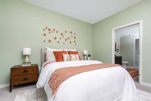 A Bedroom With a Bed And Lamp at North Grove, Riverside, CA, 92501