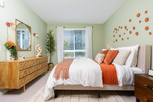 A Bedroom With Dresser And Mirror at North Grove, Riverside, CA