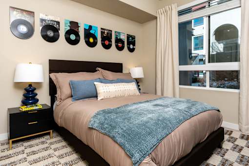 A Bedroom With a Wall Of Vinyl Records at North Grove, Riverside, CA, 92501