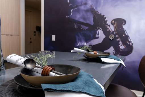 A Dining Table With a Blue Towel And a Bowl On It at North Grove, Riverside, CA, 92501