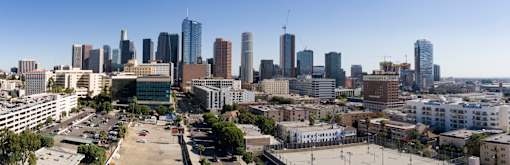 A cityscape with tall buildings and a clear sky at Wilshire Valencia Apartment, Los Angeles, 90017