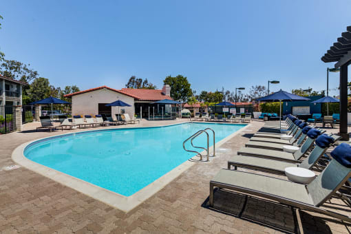 Outdoor pool area with lounge chairs at Pointe Niguel, Laguna Niguel, California