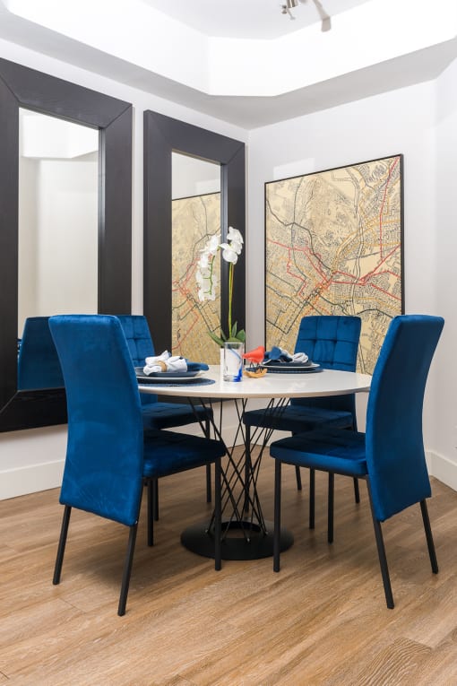Artistic Finished Dining Room at The Preston Miracle Mile Apartments, California