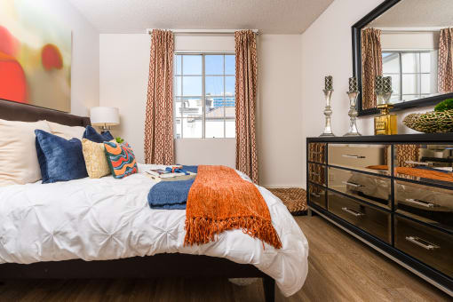 Lavish Bedroom With Ample Storage at The Preston Miracle Mile Apartments, Los Angeles, California