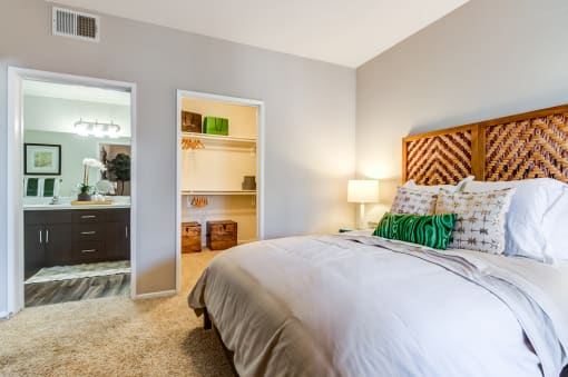 The Promenade Rio Vista Apartments in San Diego, CA With Wall to Wall Carpet, Large Windows, and a Spacious Closet