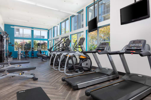 Luxury Apartments in San Fransisco - Strata at Mission Bay - Fitness Center with Flat Screen TVs and Exercise Equipment