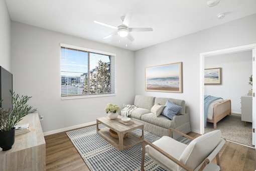 Living room with couch and ceiling fan