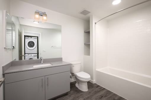 Bathroom with sink, toilet and tub