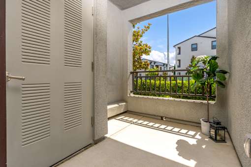 A white door with a window in front of it.