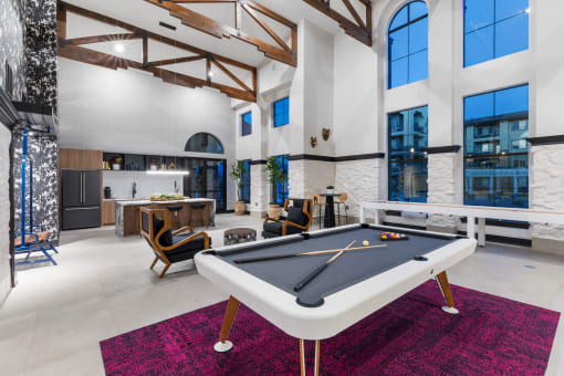 clubhouse with pool table at the m on hennepin