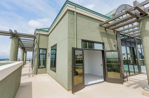 a view of a building with glass doors and windows at Vendome Place, San Jose, 95110