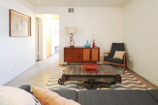 Old Town Scottsdale Apartments - Open-Floor Living Room With Concrete-Style Flooring.