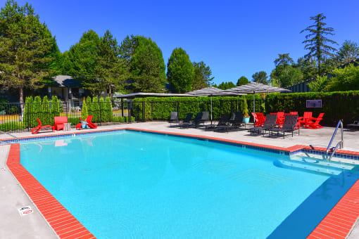 Sparkling Pool Featuring Various Lounge Areas at Woodlake Apartments, Kirkland